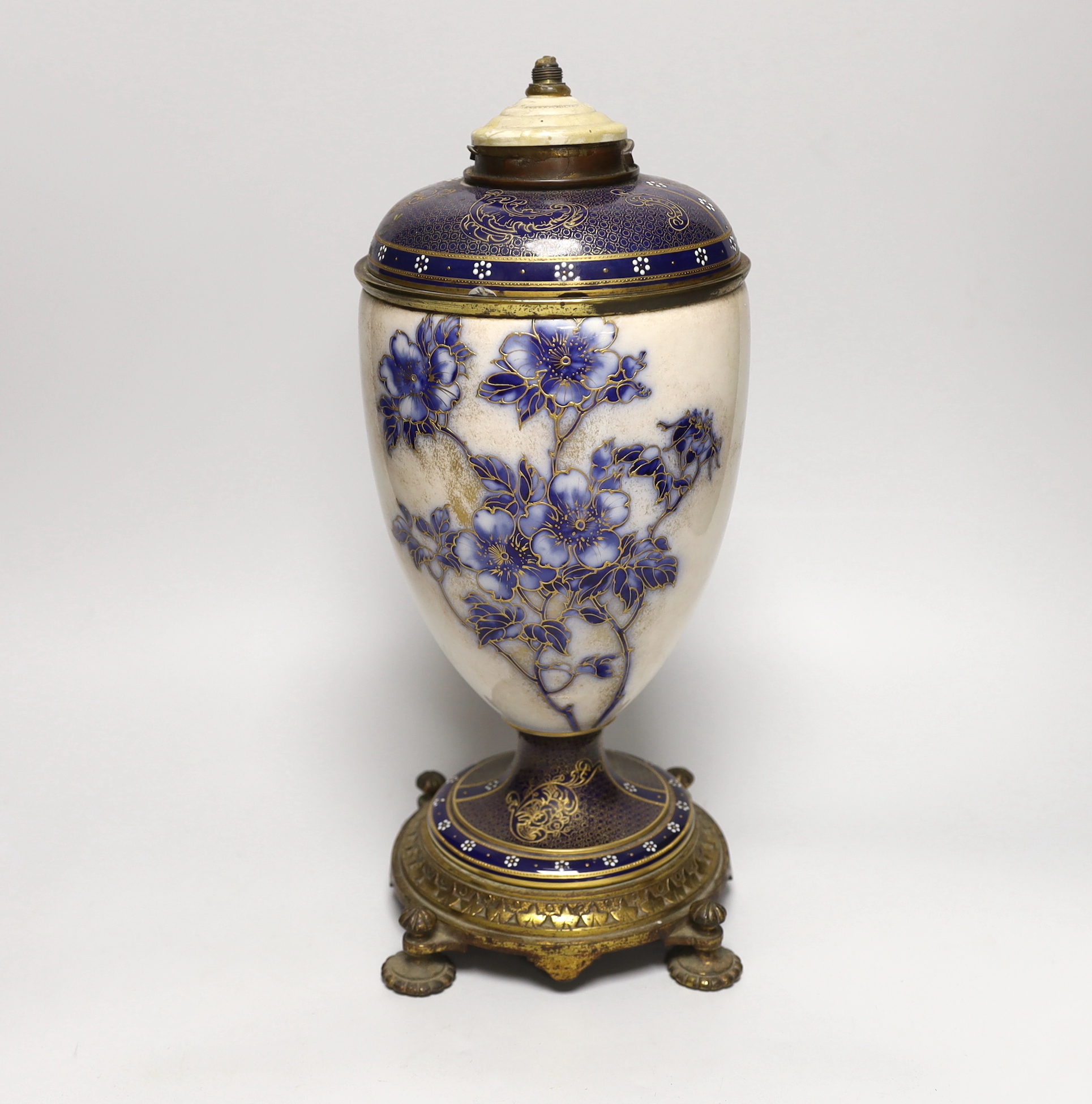 A Victorian gilt-metal mounted ceramic lamp base, 37cm tall